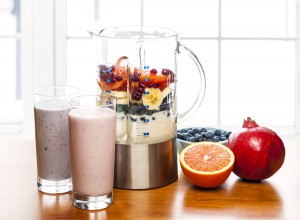 Making Smoothies In Blender With Fruit And Yogurt